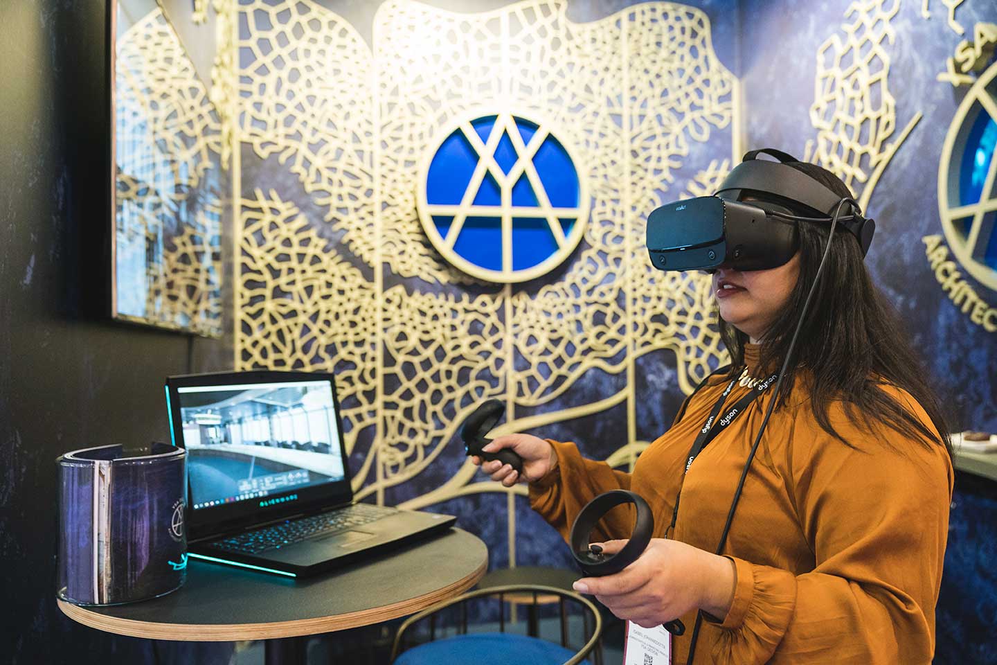 a cruise ship interiors expo europe attendee using a vr headset on YSA Design's stand at cruise ship interiors expo europe 2019