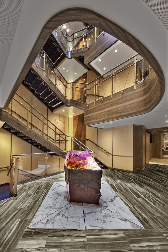 seabourn venture atrium staircase with statue in the middle