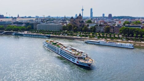 a-rosa sena sustainable river cruise ship sailing on the water aerial photo