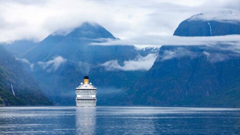 cruise liner sailing on hardanger fjorden