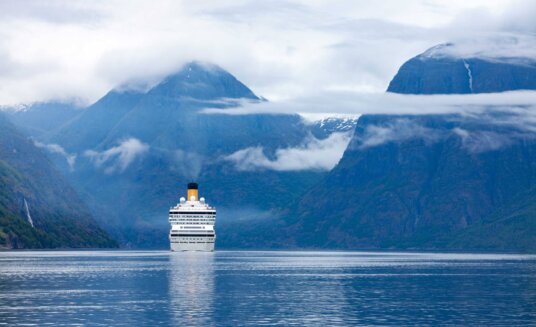 cruise liner sailing on hardanger fjorden